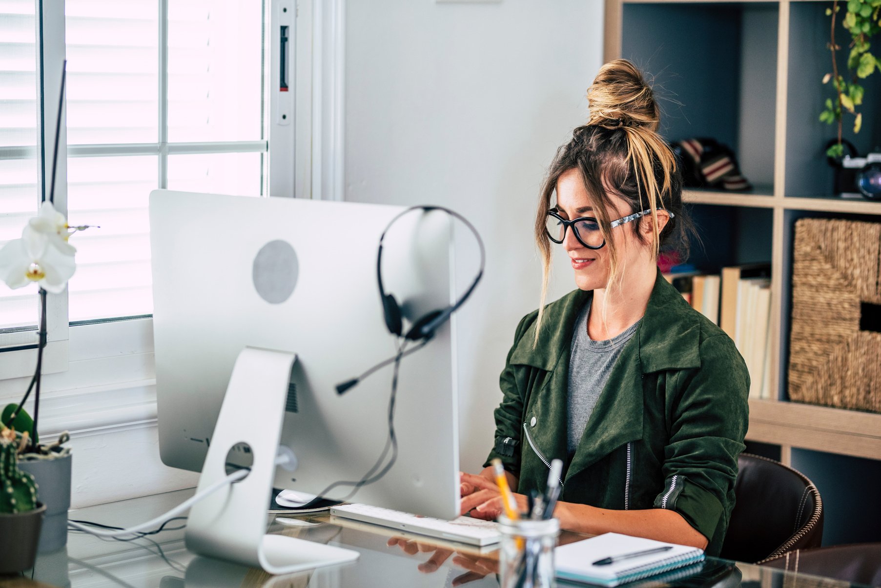 Woman Typing on Her Computer